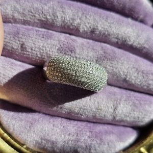 Genuine diamond ring size 8. Please note: 1 small diamond missing. Price reflect